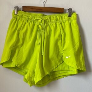 Nike women’s athletic shorts, neon yellow, drawstring, size large.  Inner shorts
